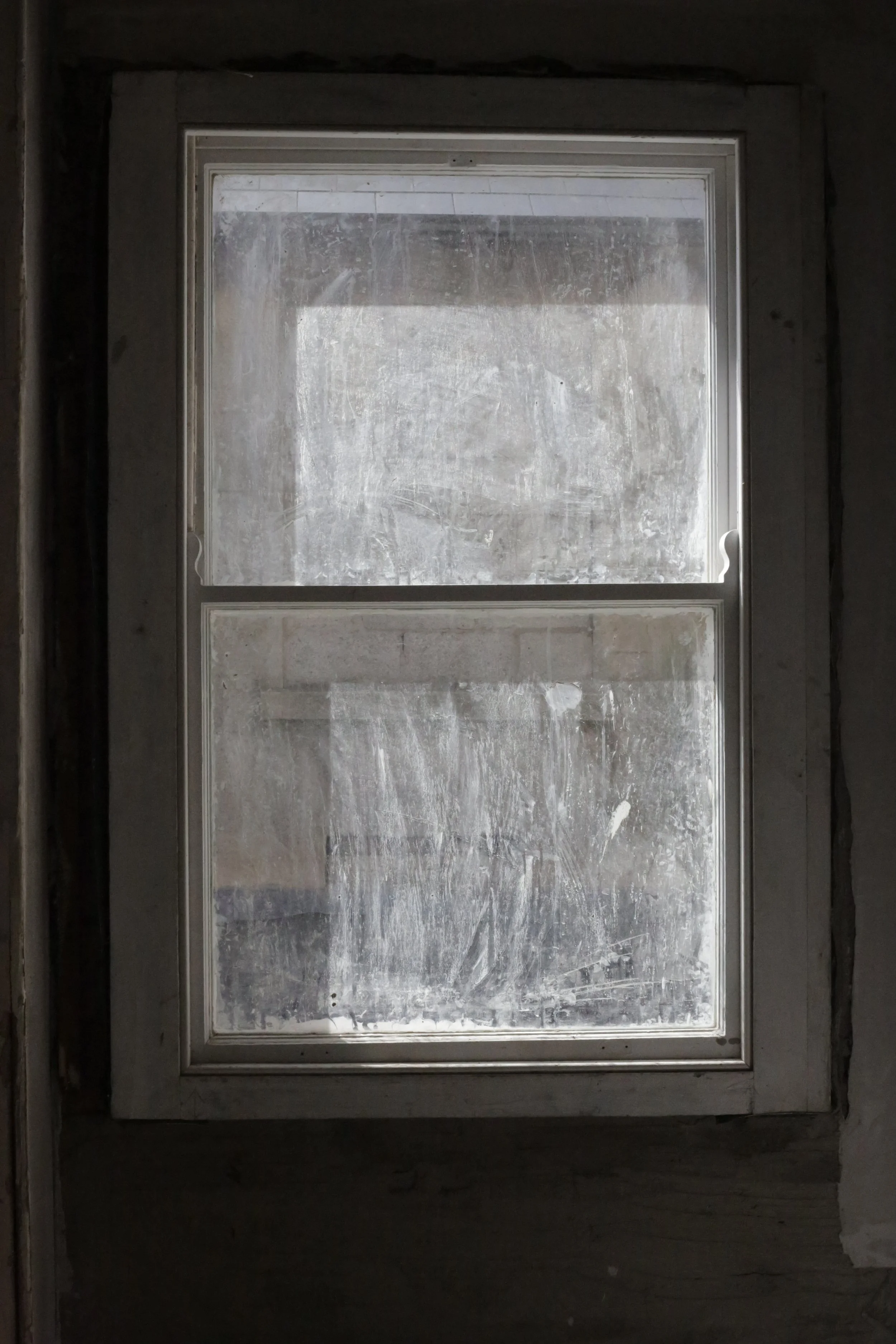 Old sash window at the side of the building