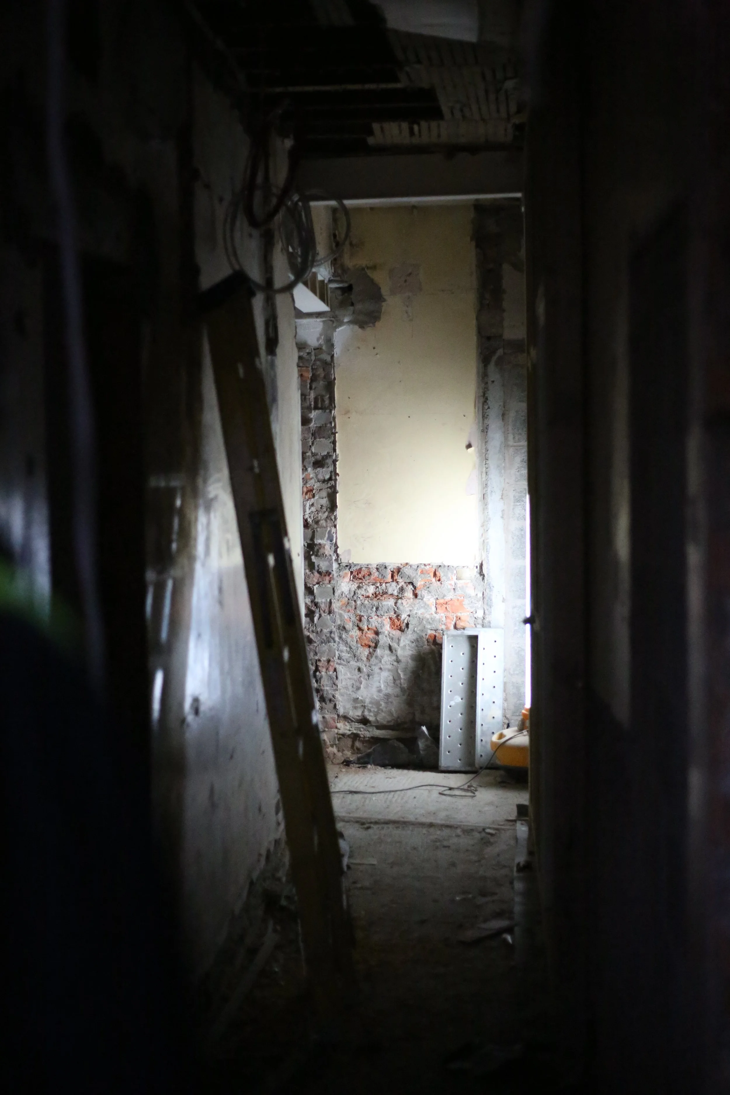 downstairs hallway looking towards the back of the building