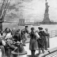 A group of women and children by the waterfront with ships and the Statue of Liberty in the background.