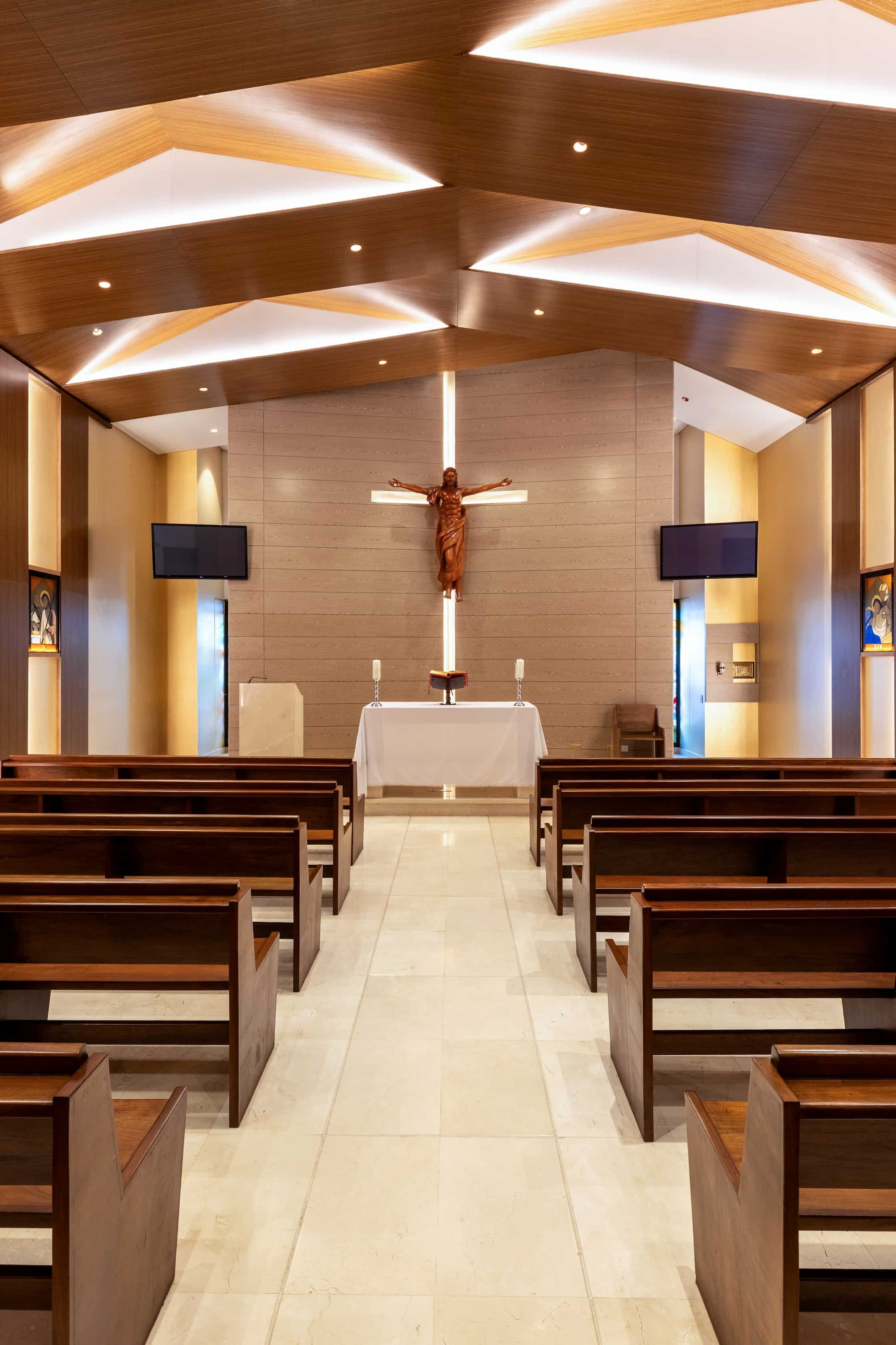 View of the Mantle Chapel interior showing warm wood and stone materials creating a sense of grounding and shelter
