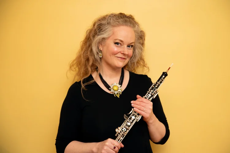 Erin Brophey holding an oboe