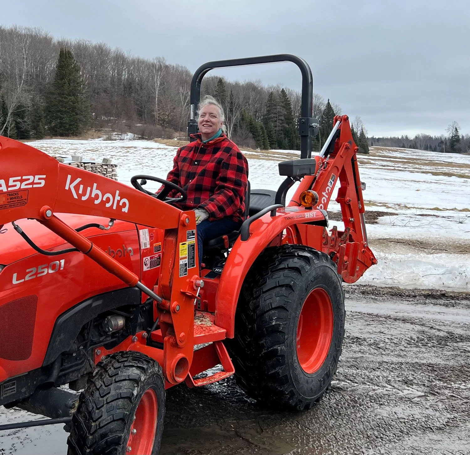 HELPERS - Sheila on the tractor.jpg