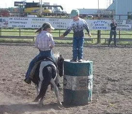 Lexi, Gage and Spotsie-competing in Monkey on the Barrel