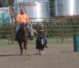 David on Cake and Douglas on Spotsie in the Sack Race