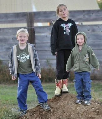 Douglas, Lexi and Gage after a hard day