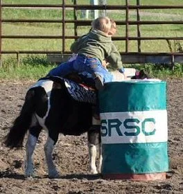 Lexi and Gage-monkey on a barrel