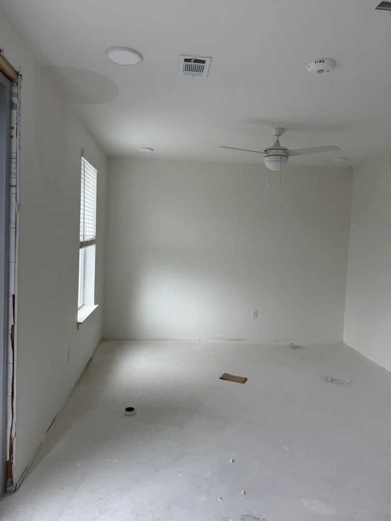 Unfinished resident amenity space during drywall construction at East 9th apartments in Dallas, TX, managed by Artbuckle & Co.
