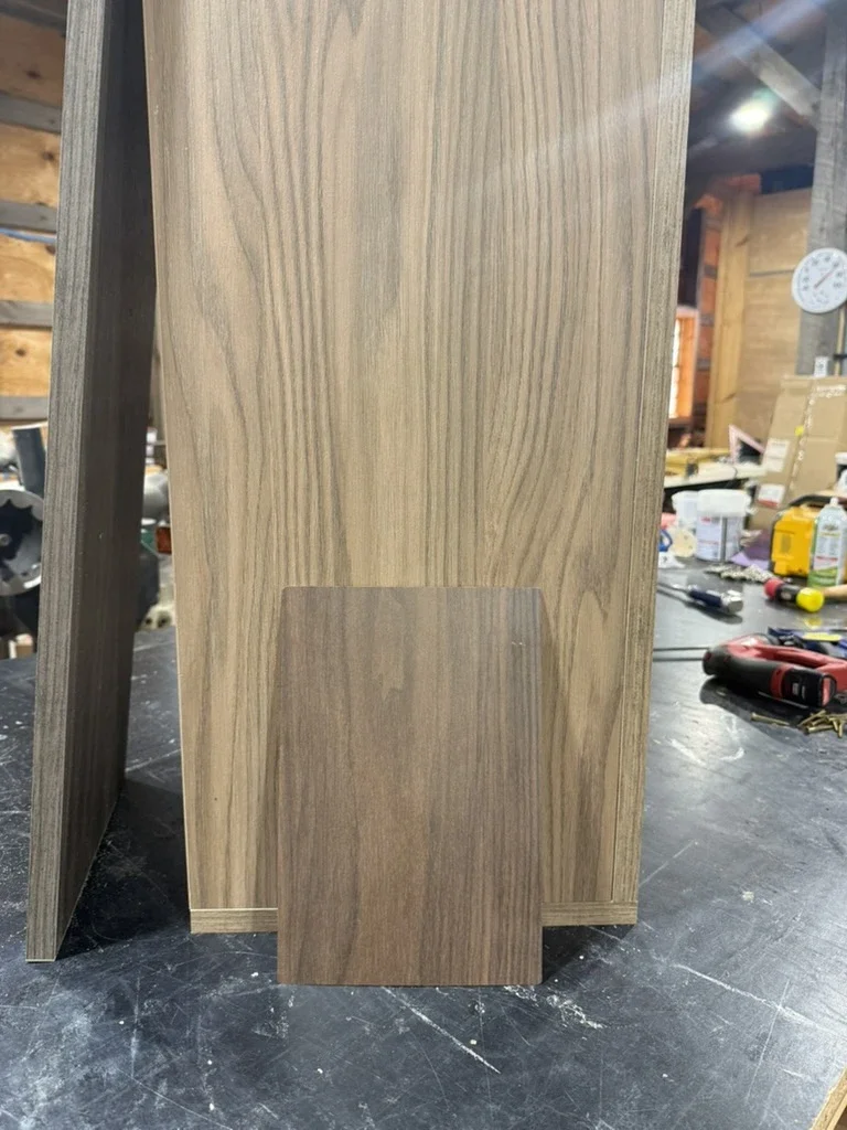 Walnut veneer panel sample for The Platform in Frisco, TX at the millwork shop. Designed by MC Cabinet Co..