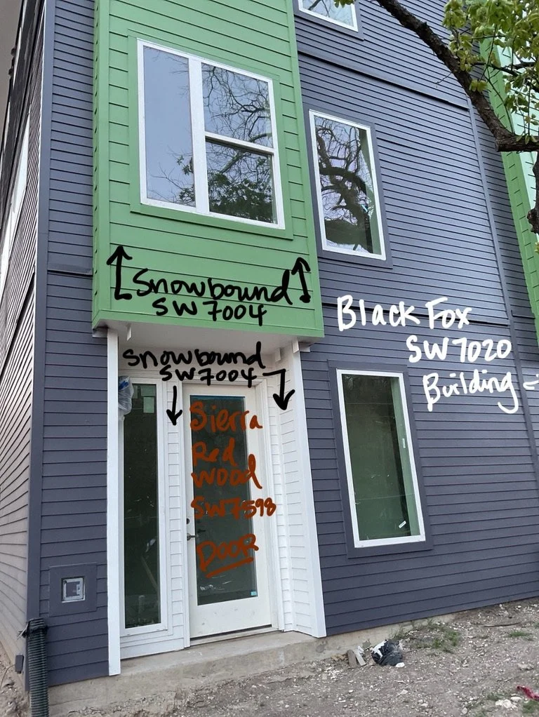 Exterior paint color specification mockups on building facade at Gateway Park in Dallas, TX, featuring Sherwin-Williams Snowbound and Black Fox by Artbuckle & Co.