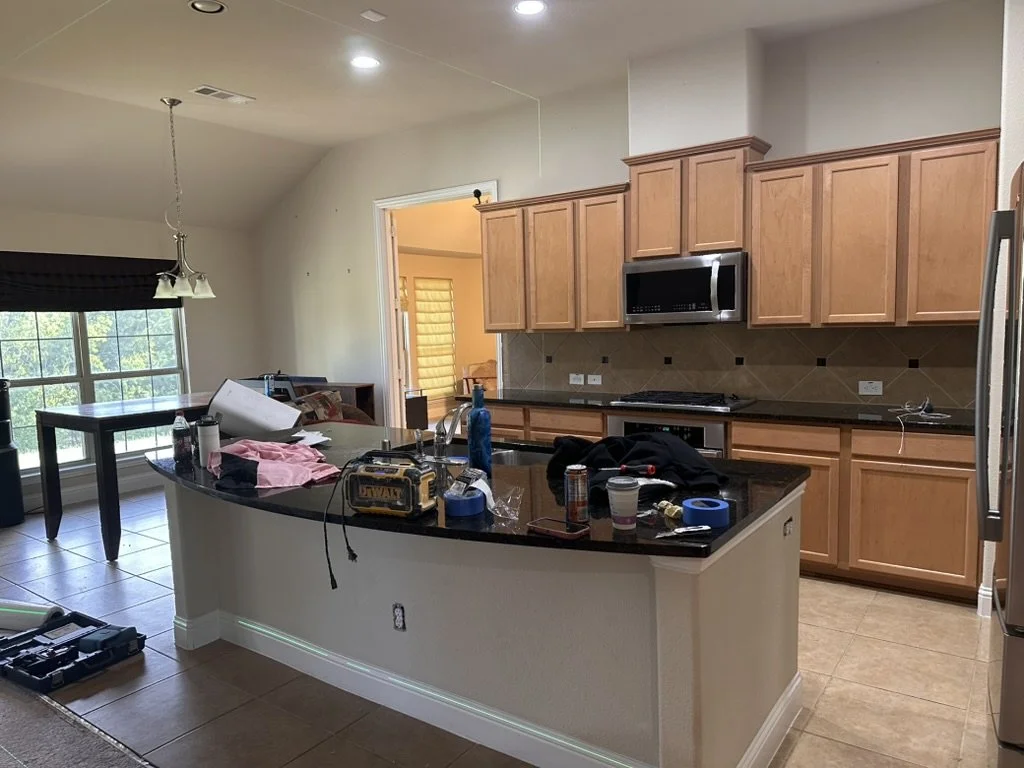 Original builder-grade oak kitchen before demolition and custom residential remodeling in Sunnyvale, Texas, managed by Artbuckle & Co.