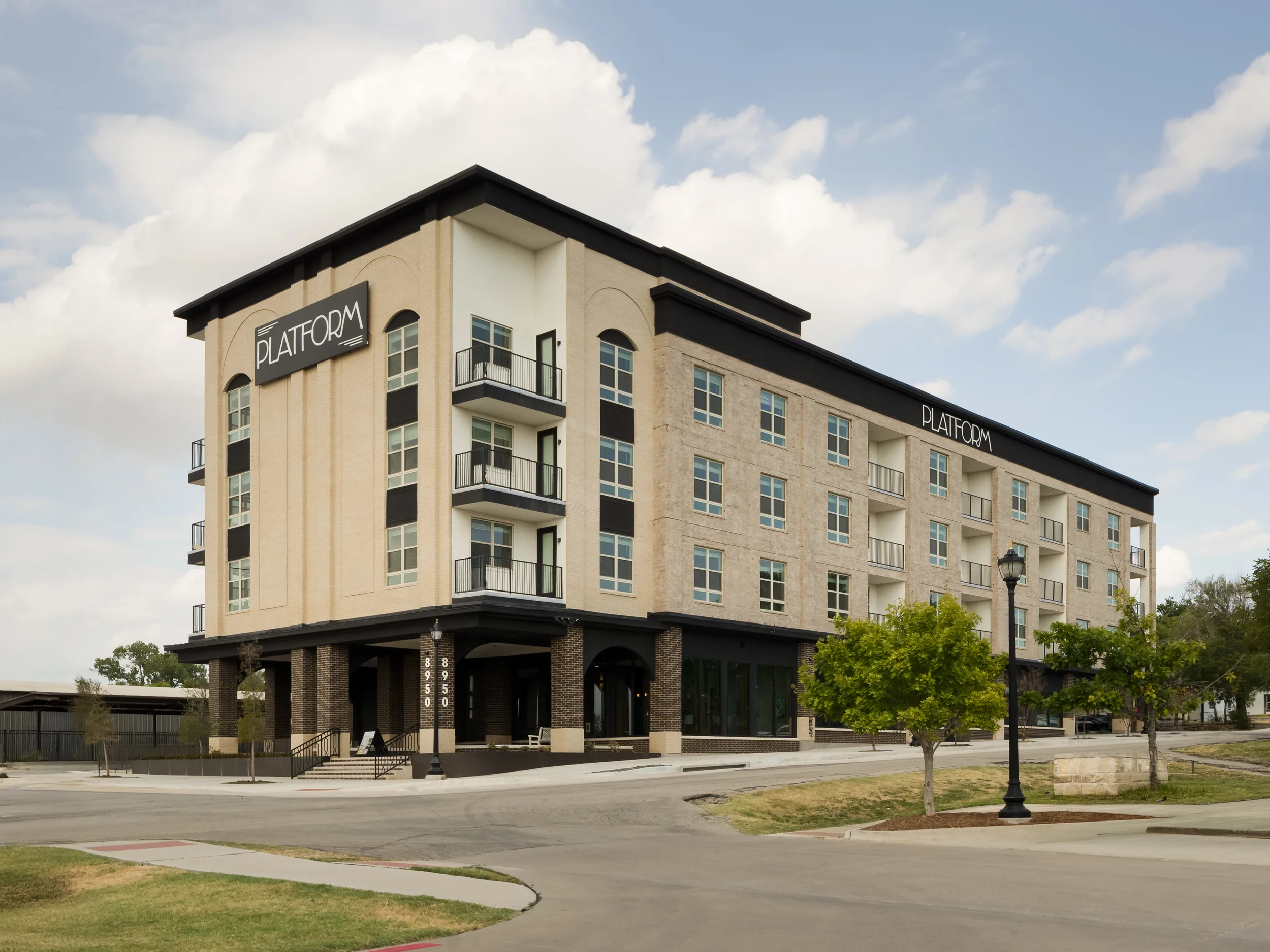 Exterior of The Platform apartment building in Frisco, TX.