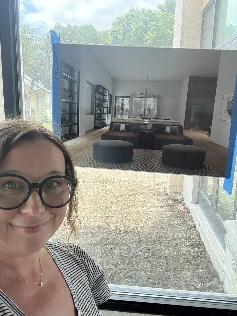 Rebecca Gillispie of Artbuckle & Co. on the active construction job site at Beacon in Frisco, TX, standing in front of a 3D rendering taped to the window.