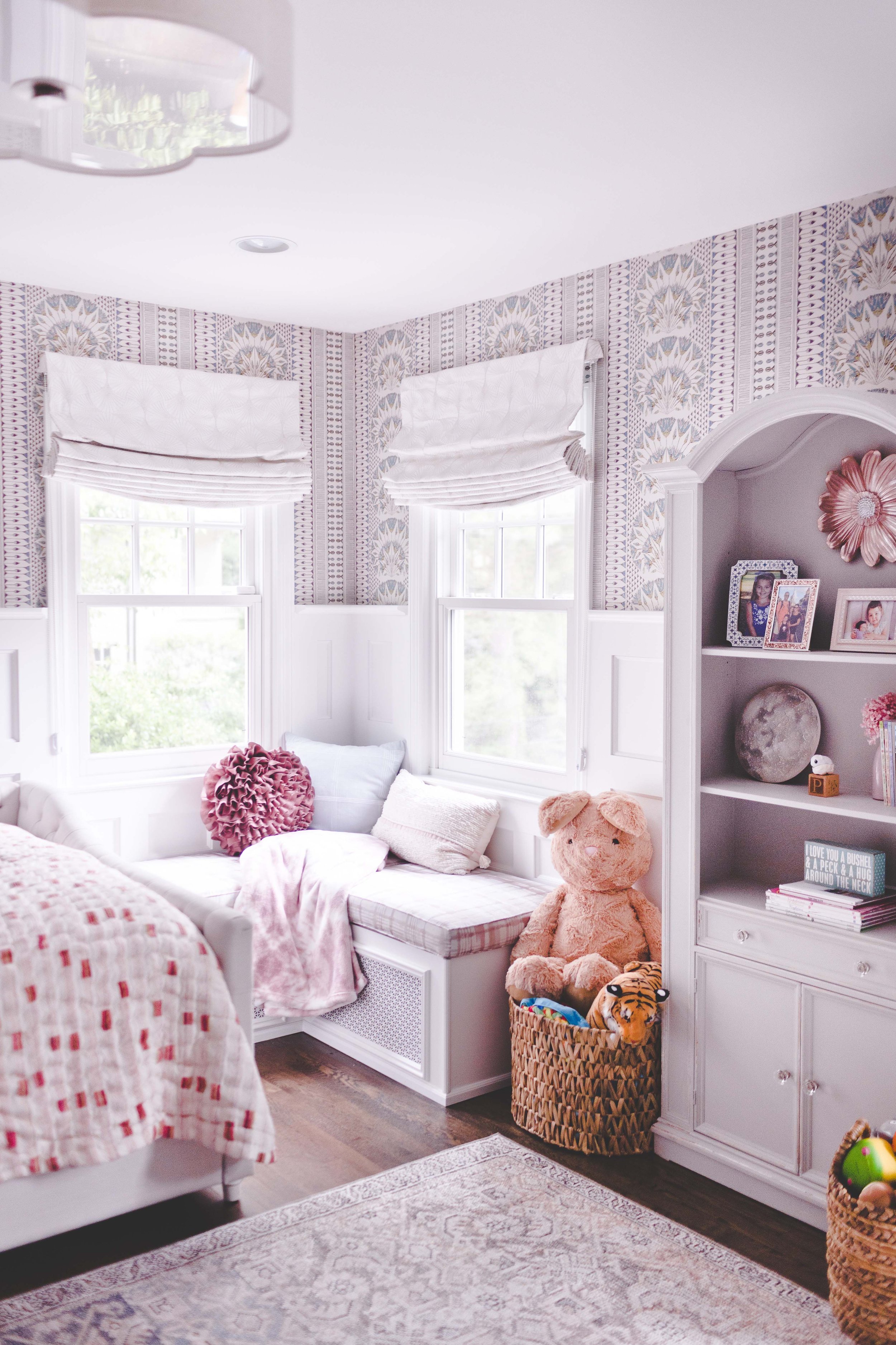 Indoor-outdoor sunroom and vibrant family spaces in the Moments on Madison project by Melissa’s Designs.