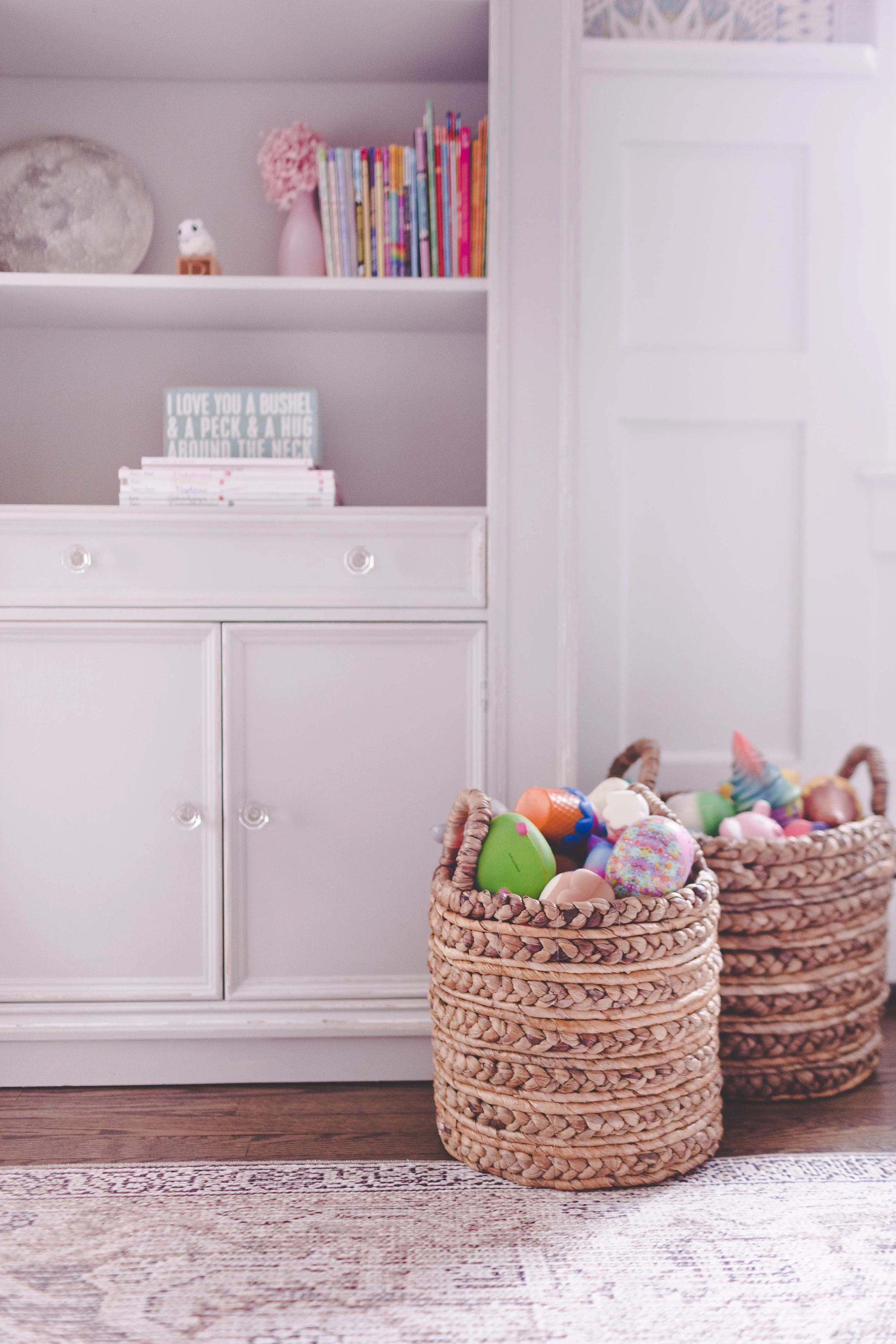 Indoor-outdoor sunroom and vibrant family spaces in the Moments on Madison project by Melissa’s Designs.