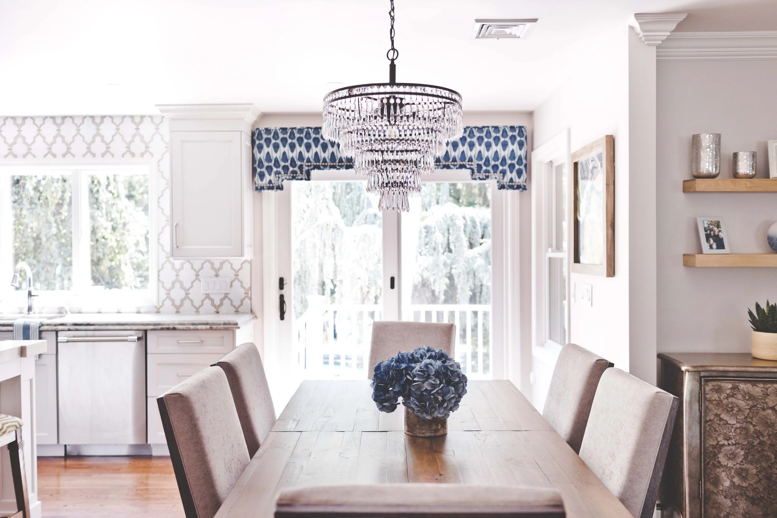 Chef-worthy kitchen and gathering spaces in The Heart of VanBlarcom project by Melissa’s Designs.