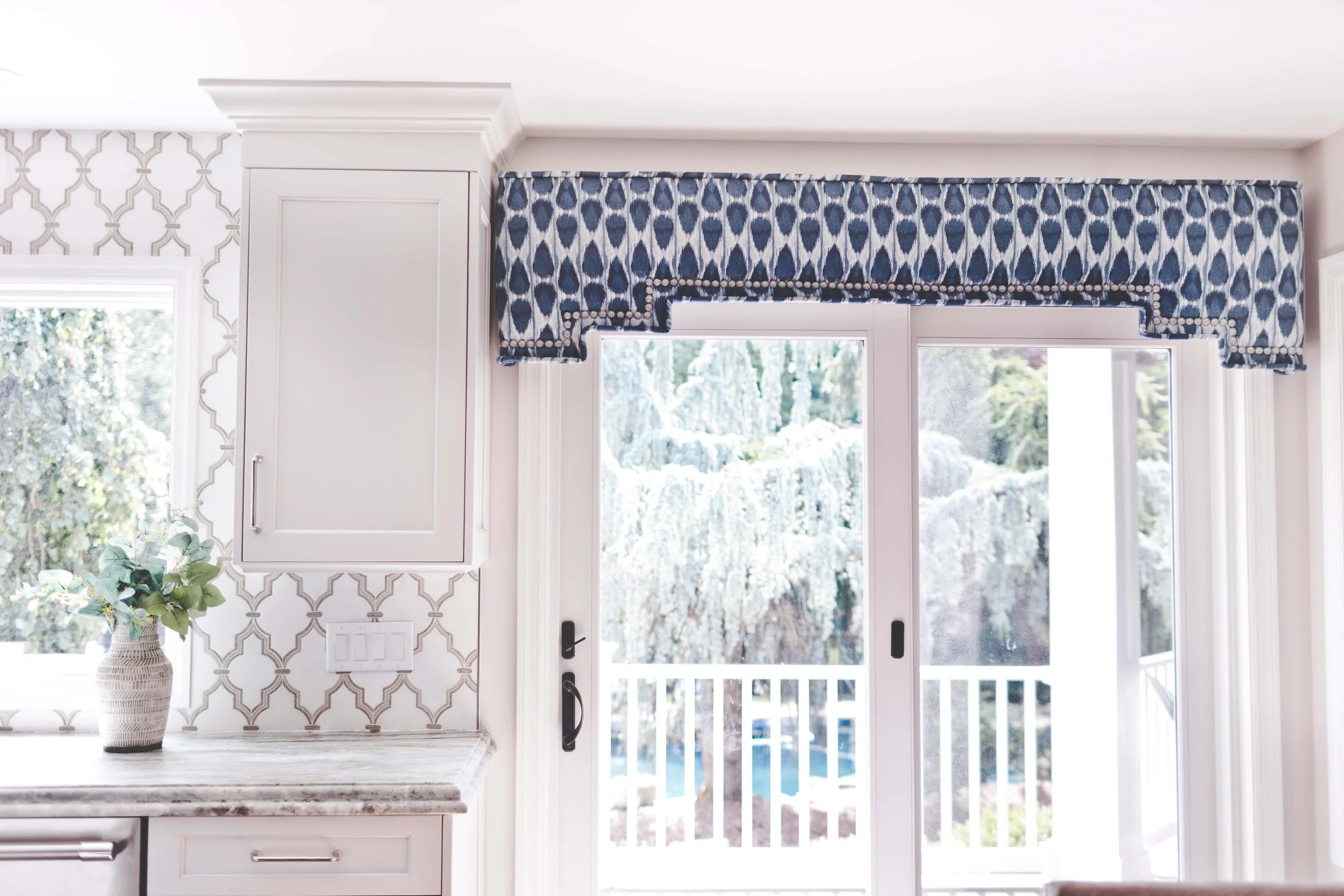 Chef-worthy kitchen and gathering spaces in The Heart of VanBlarcom project by Melissa’s Designs.