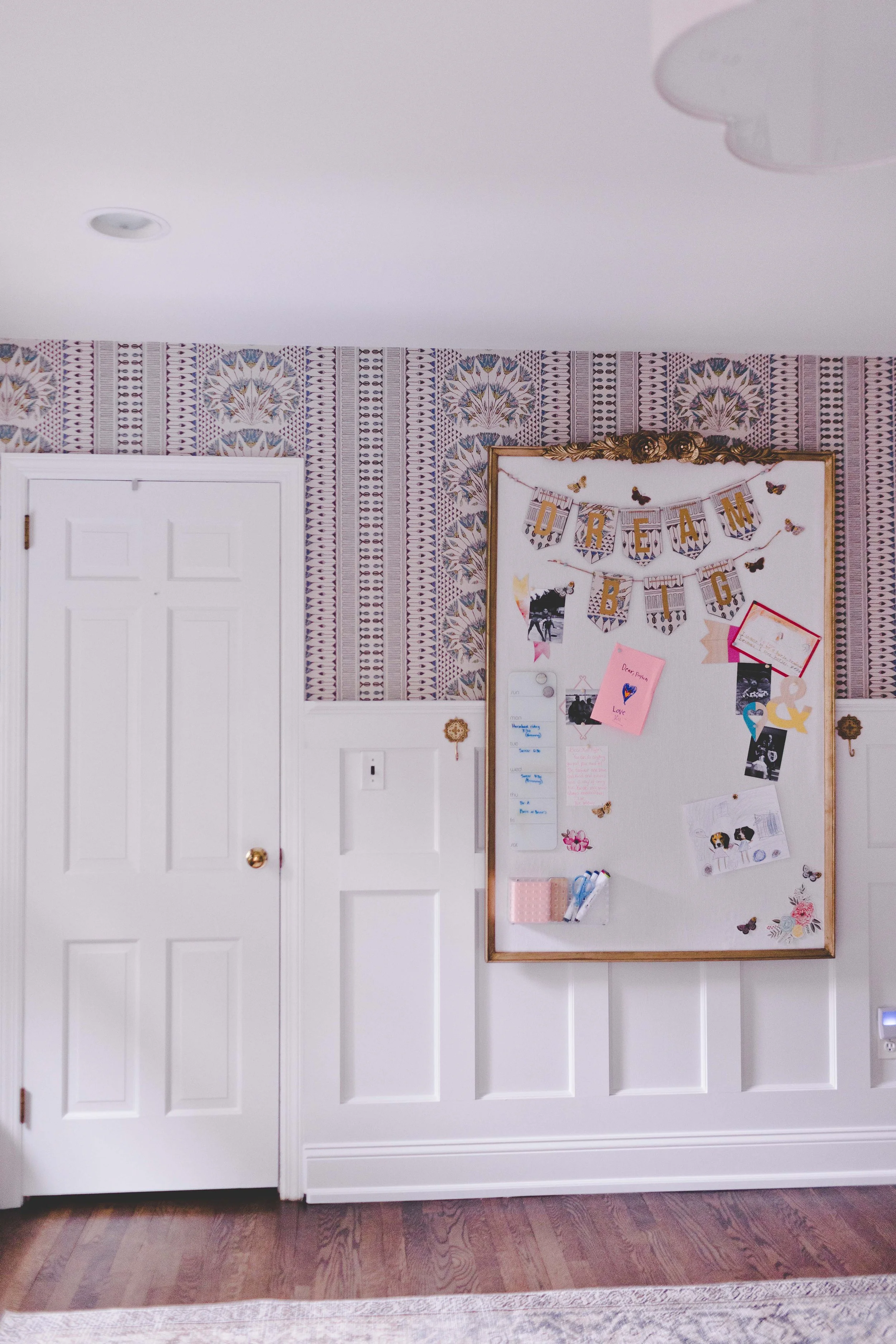 Indoor-outdoor sunroom and vibrant family spaces in the Moments on Madison project by Melissa’s Designs.