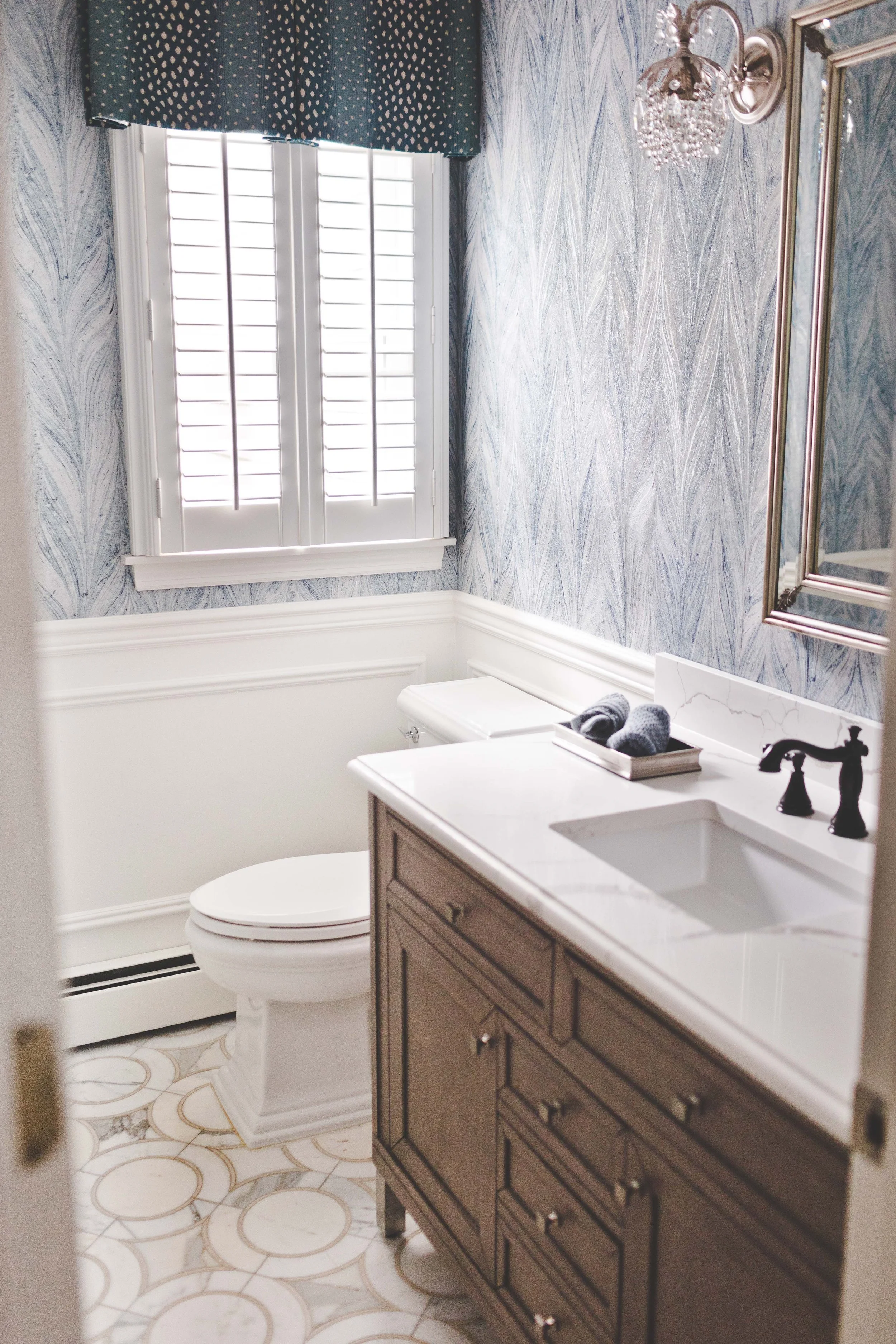 Chef-worthy kitchen and gathering spaces in The Heart of VanBlarcom project by Melissa’s Designs.