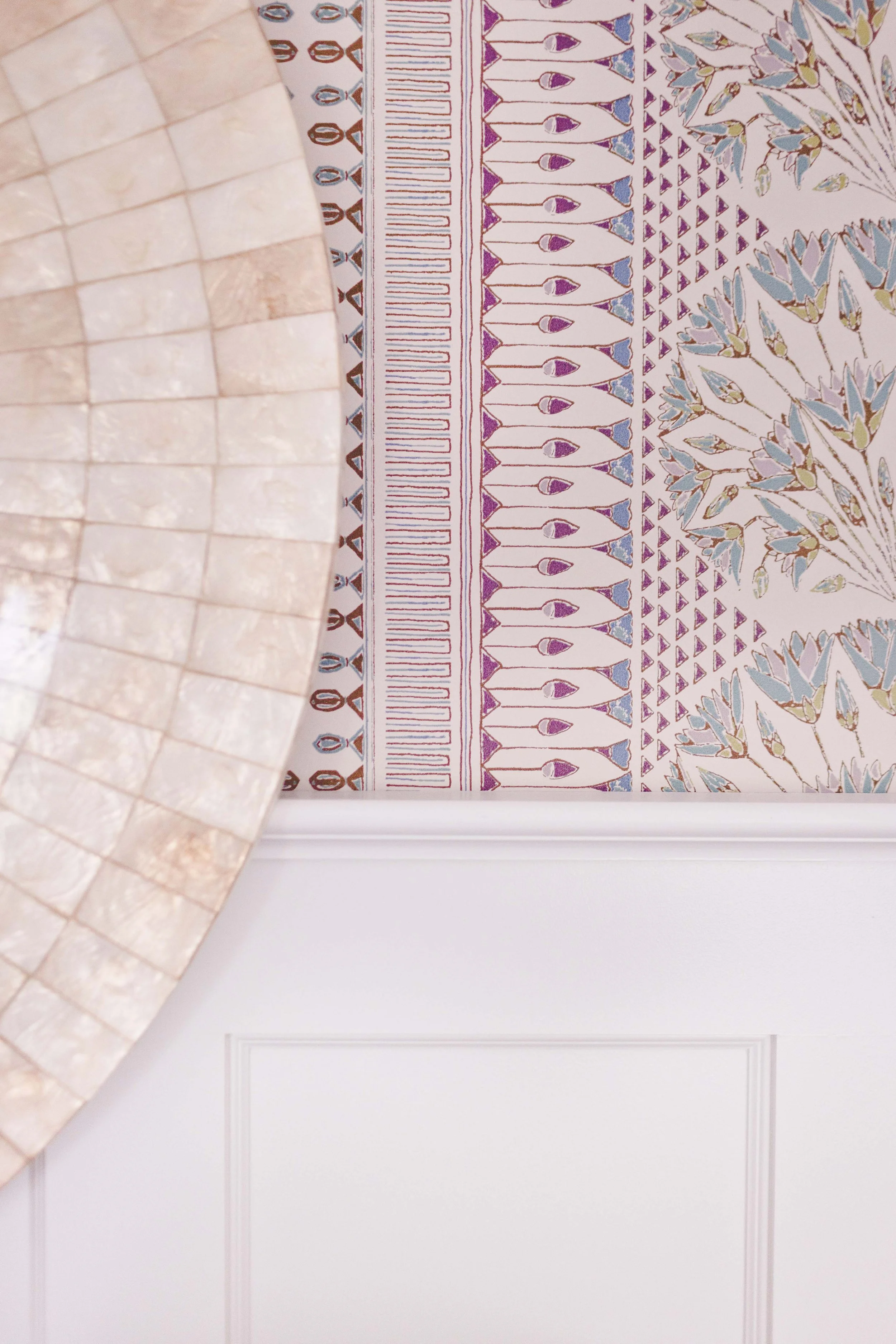 Indoor-outdoor sunroom and vibrant family spaces in the Moments on Madison project by Melissa’s Designs.