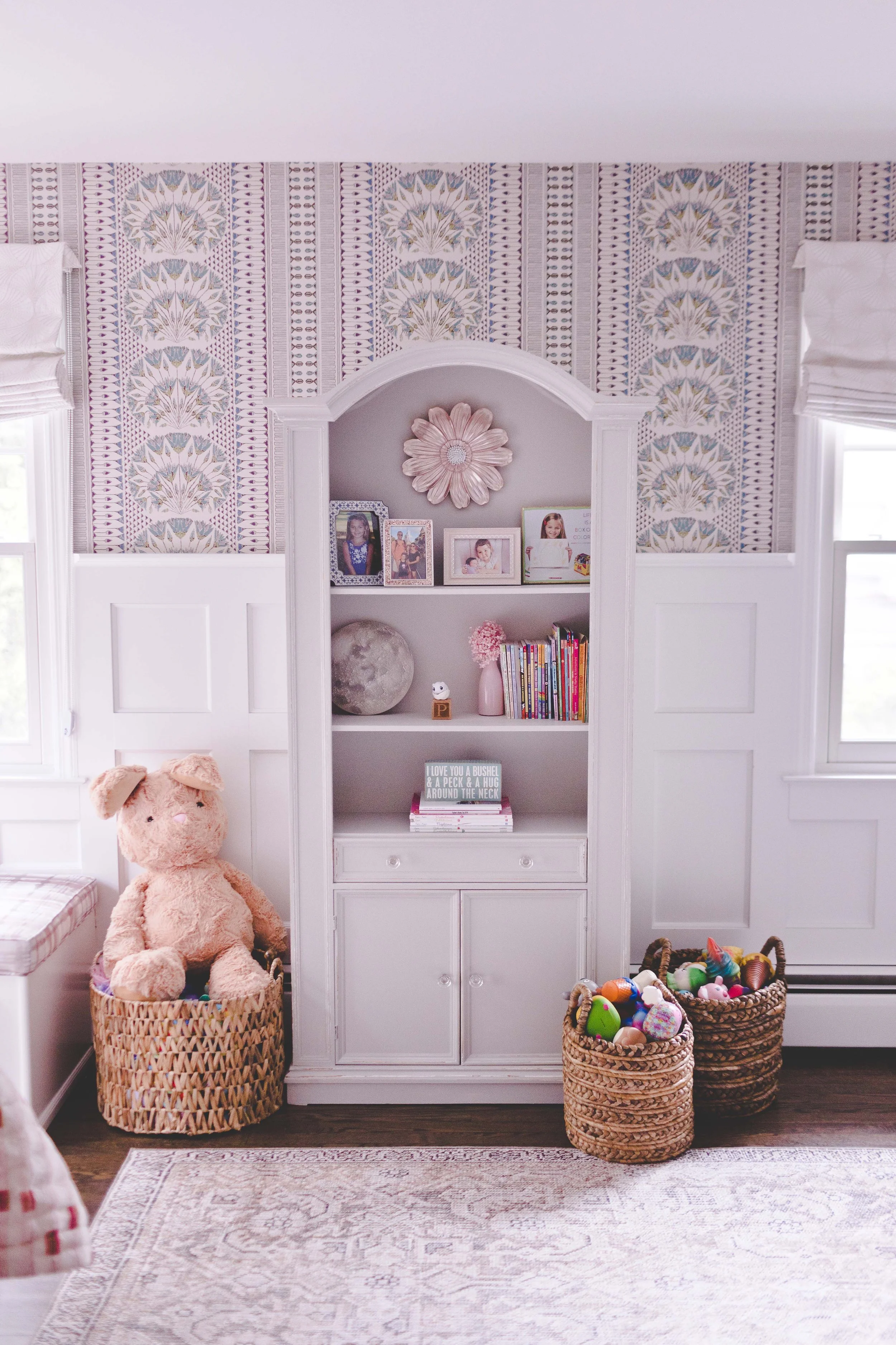 Indoor-outdoor sunroom and vibrant family spaces in the Moments on Madison project by Melissa’s Designs.