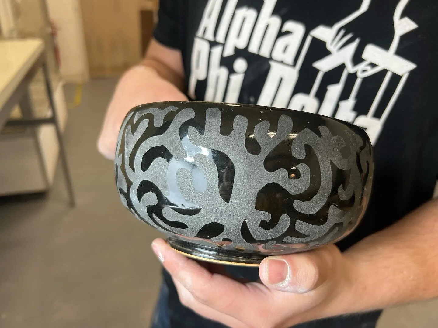 Another example of sandblasting on glazed ceramics.