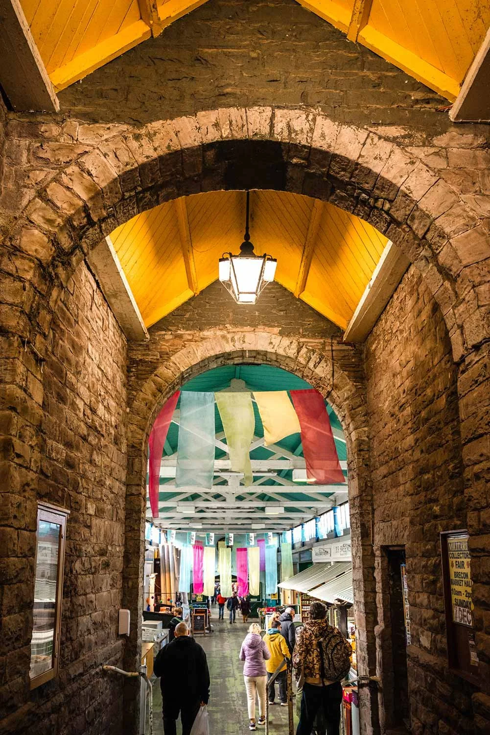 The beautiful stone arch entrance to Brecon Market Hall in Powys.