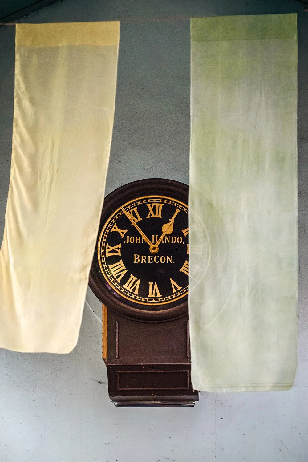 The clock inside Brecon Market Hall in Powys.
