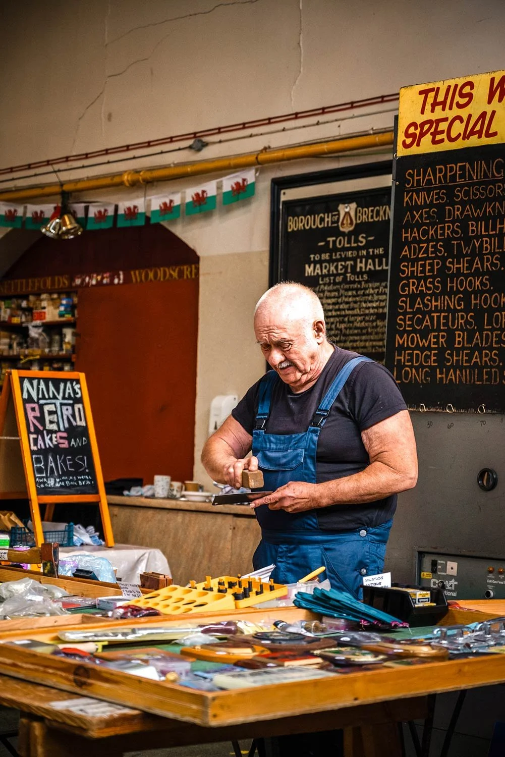 A trader at the Saturday Market in Brecon Market Hall in Powys.