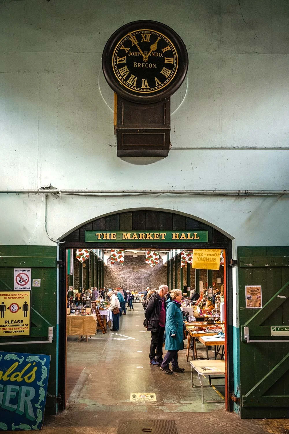 Inside the arcade entrance to Brecon Market Hall in Powys.