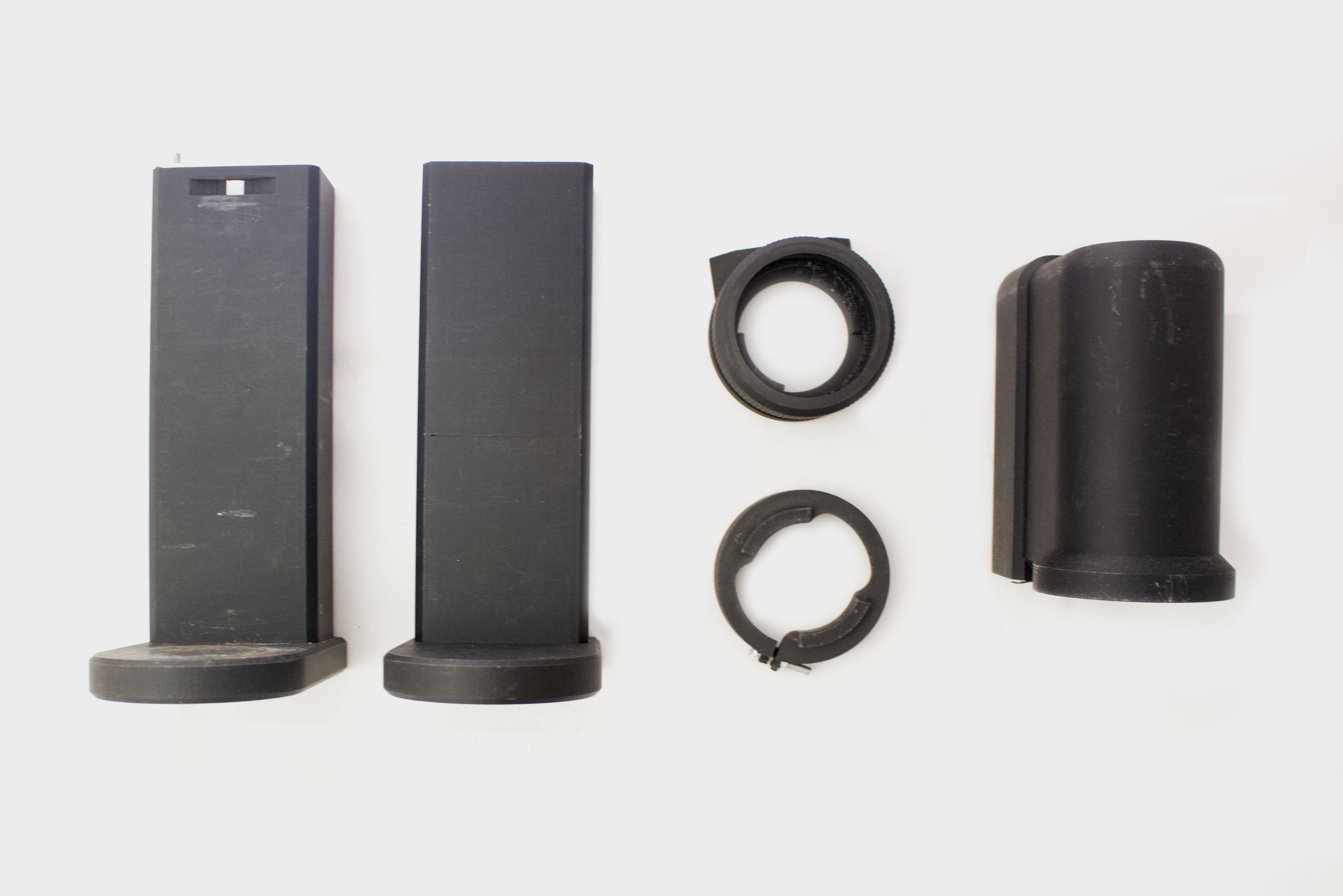 Two variants of bottom parts and one top part, together with fasteners for that attach to the grinder