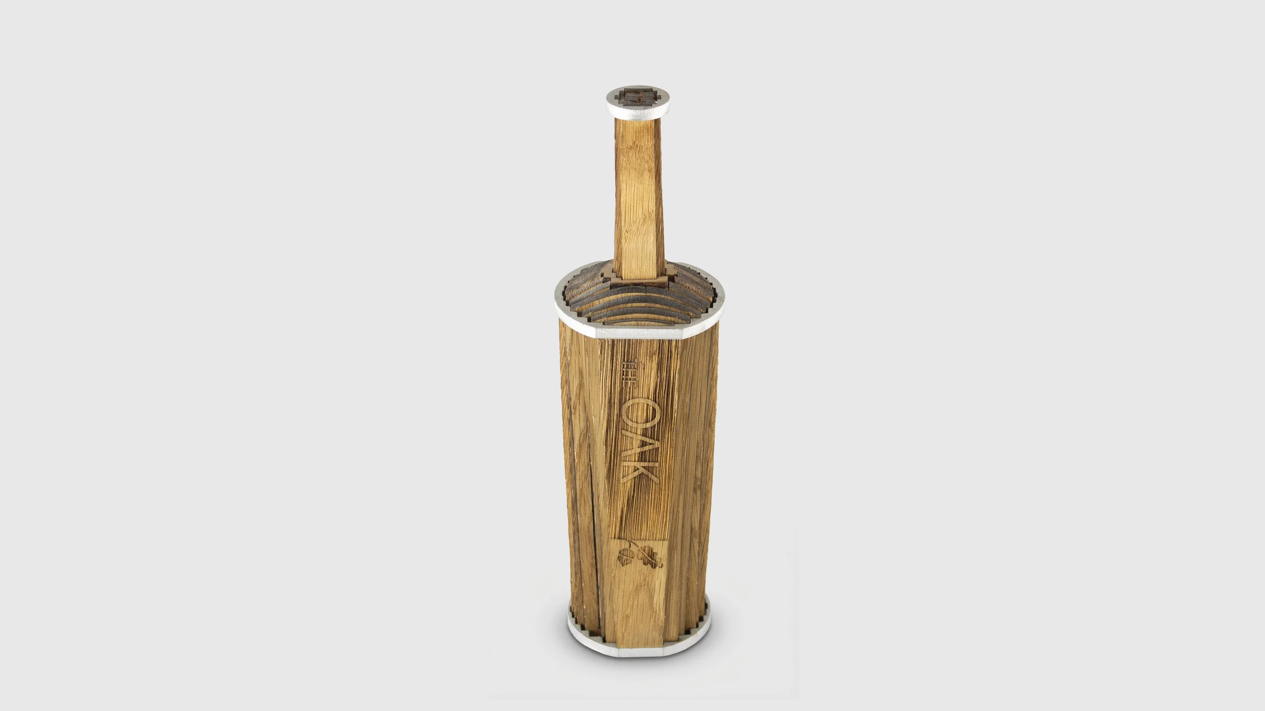 "Oak bottle" - a combination of a bottle and an oak cask. The idea is to let the whiskey mature in the bottle instead of a cask, which will go quicker because of the higher surface to volume ratio. 
