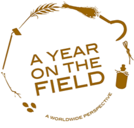Logo with a fishing rod, a bottle, and a clover, featuring the text 'A Year on the Field' in the center.