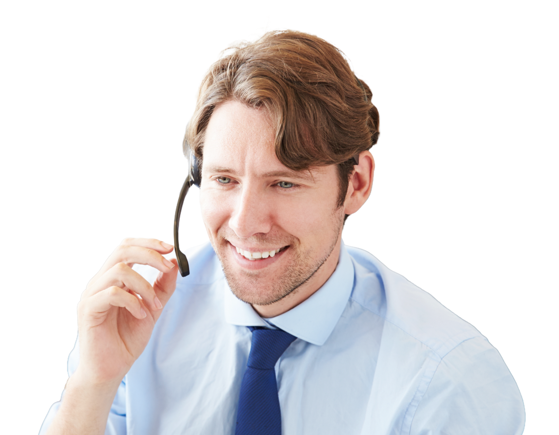 A young man with brown hair wearing a blue shirt and blue tie, smiling, talking on a headset.