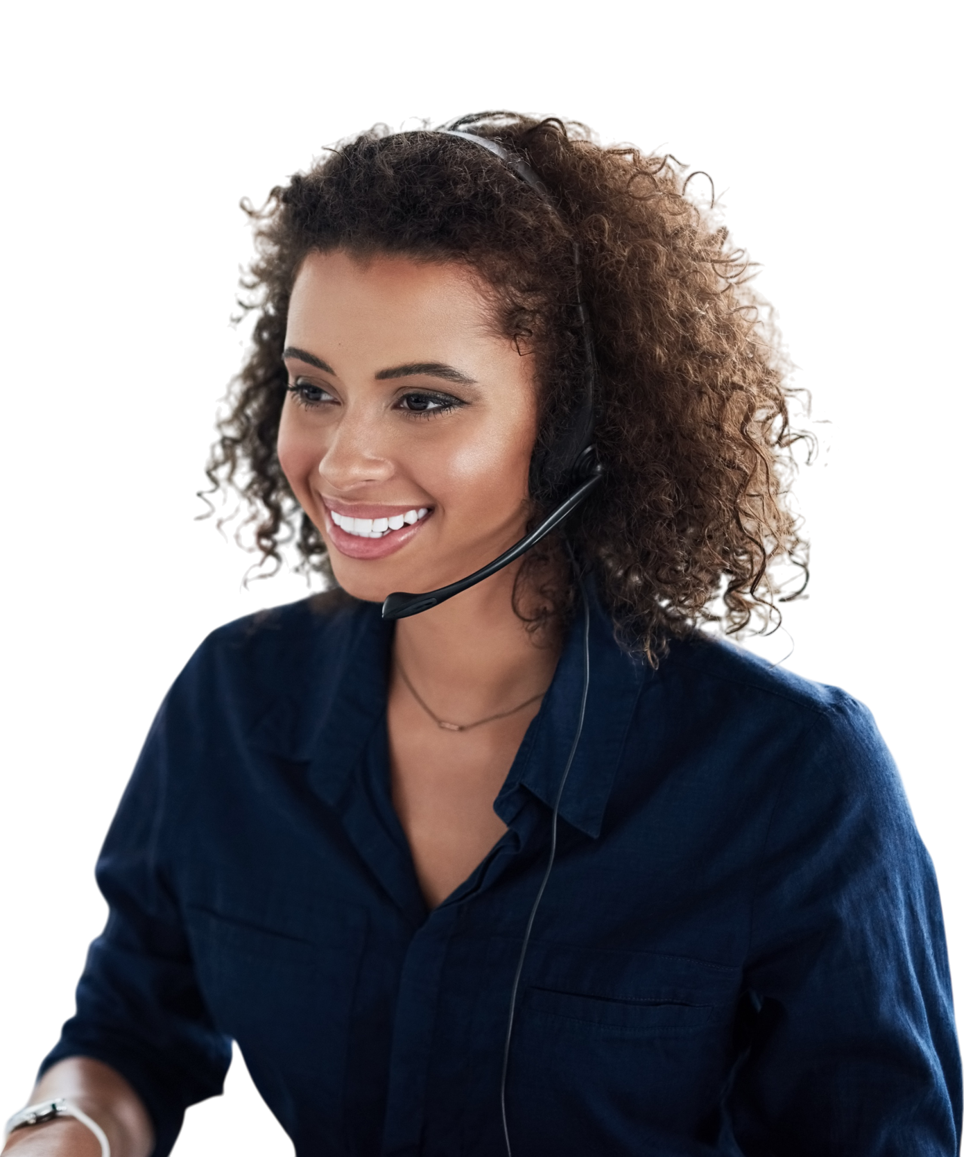 A smiling woman with curly hair wearing a headset and a dark blue shirt.