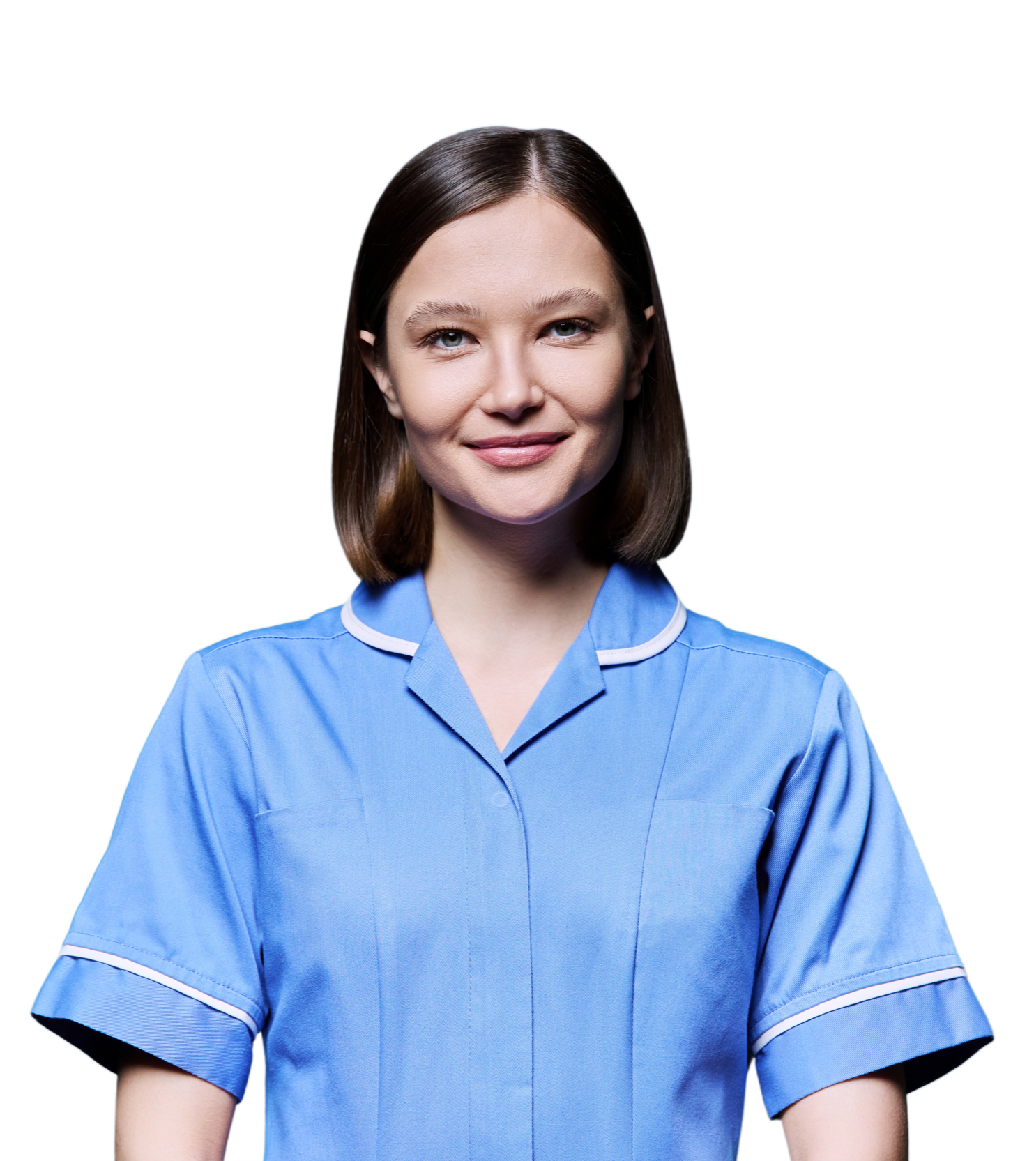A young woman with shoulder-length brown hair, wearing a blue nurse uniform, smiling at the camera.