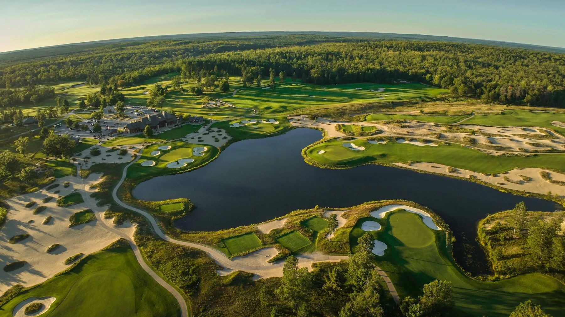 Panoramic view of Forest Dunes Golf Resort surrounded by the forests of Northern Michigan