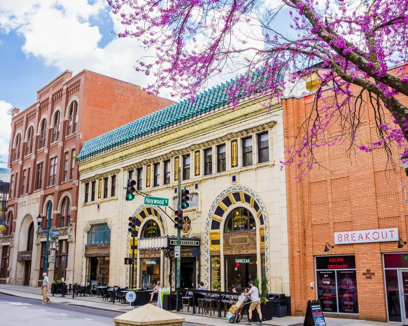 Downtown Asheville street with a taproom featuring Highland Brewing, a cornerstone of the city's craft beer scene