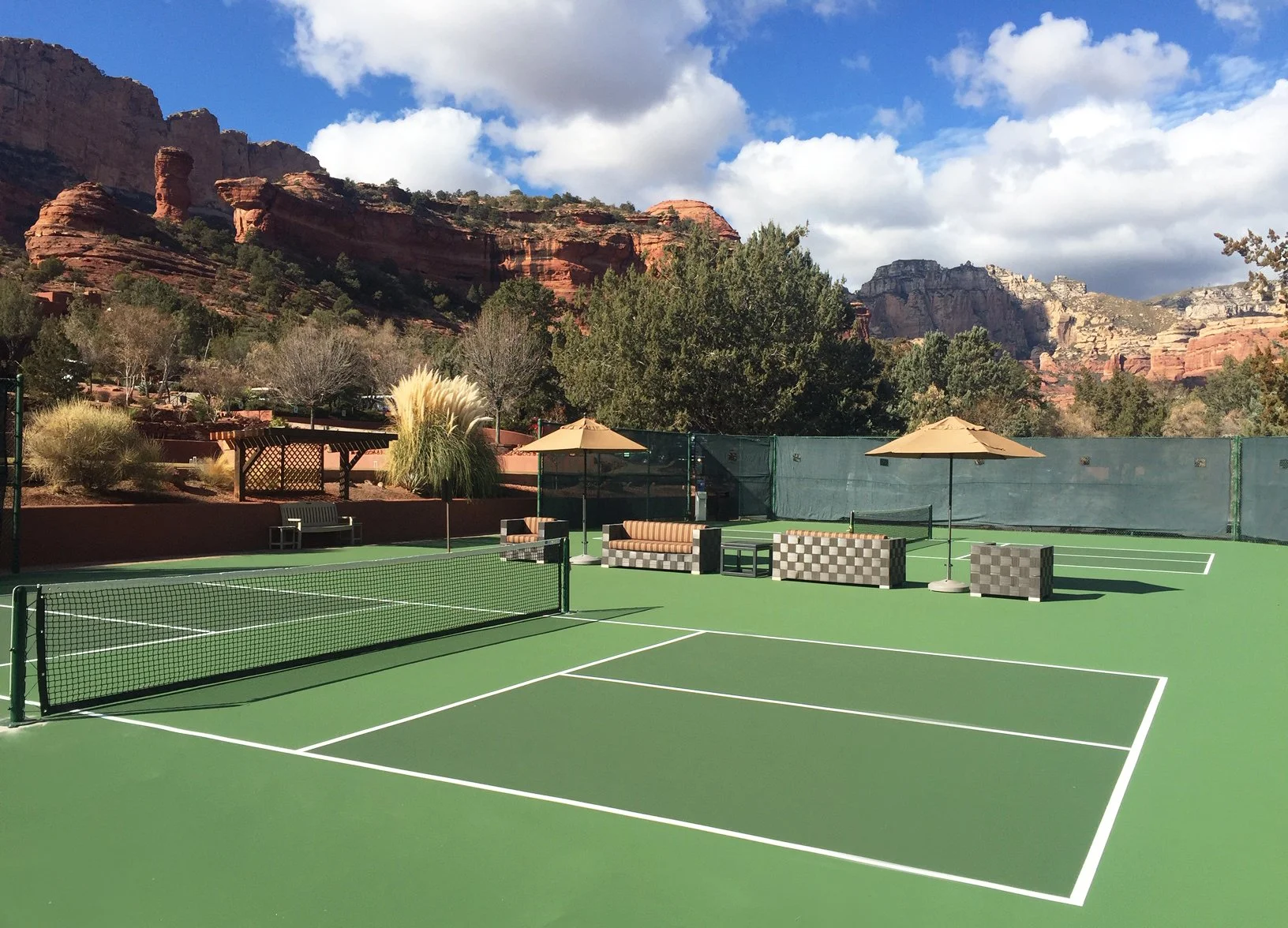 Pickleball courts at Enchantment Resort set against Sedona’s red rock canyon backdrop