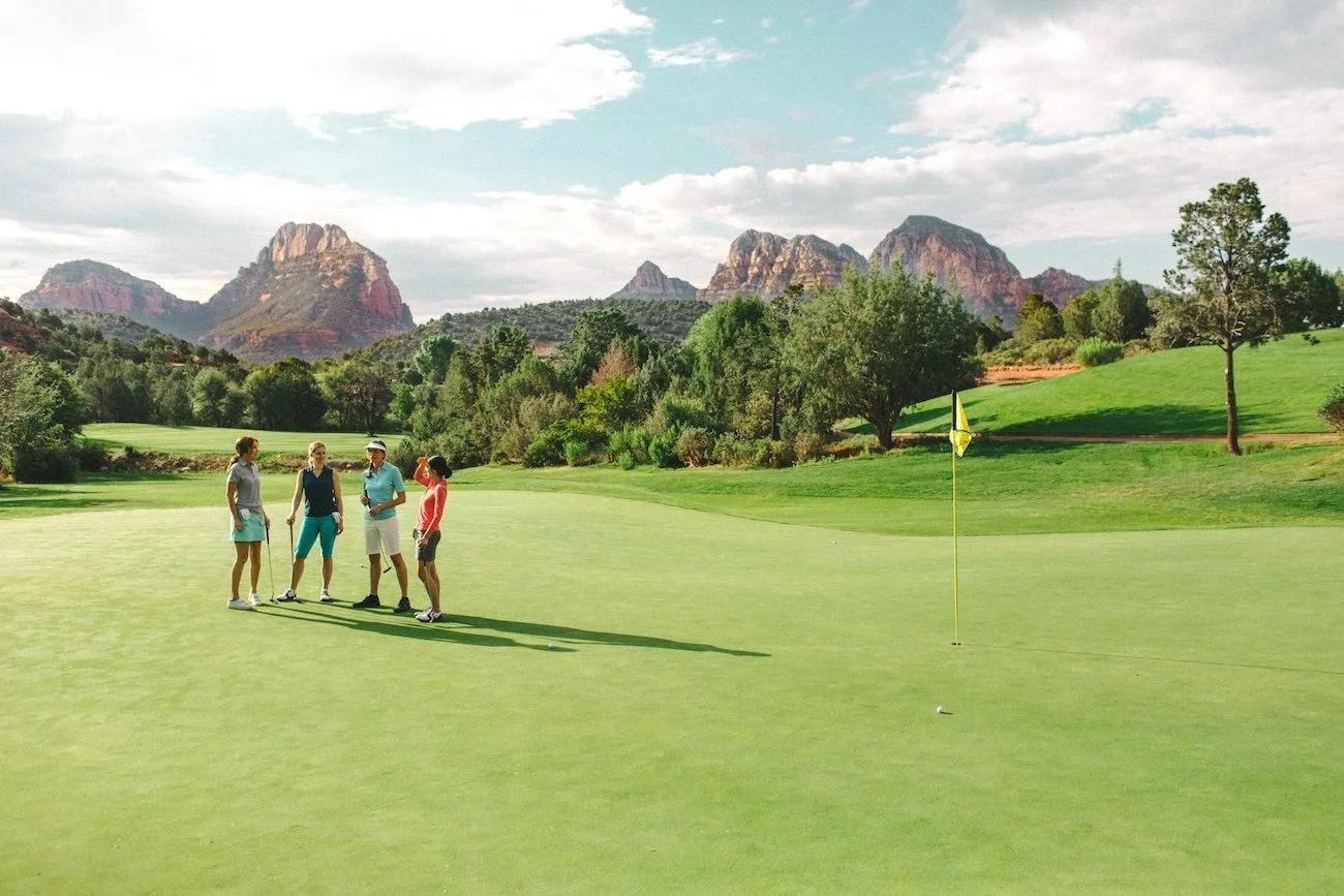 Women golfers on the green at Seven Canyons Golf Course in Sedona desert setting