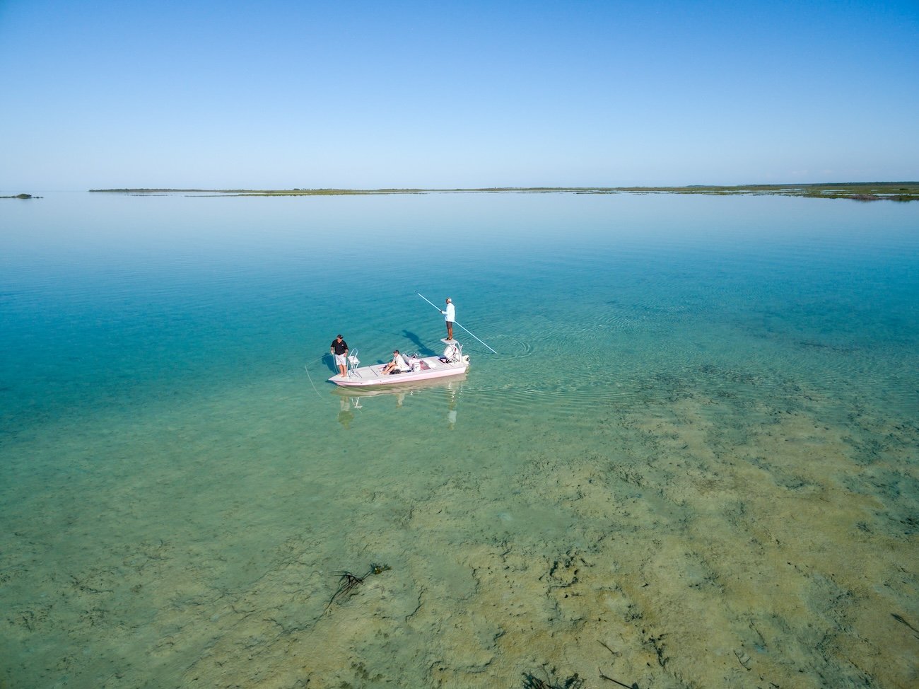 Bonefishers navigating the shallow waters near The Abaco Club on Great Abaco Island