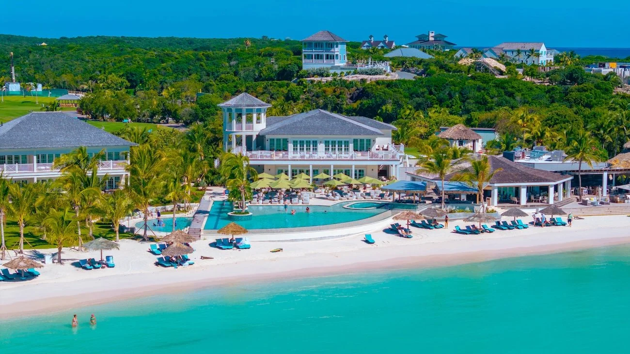 Aerial view of The Bay Club at The Abaco Club as members enjoy the pools, the beach and the turquoise waters of Winding Bay