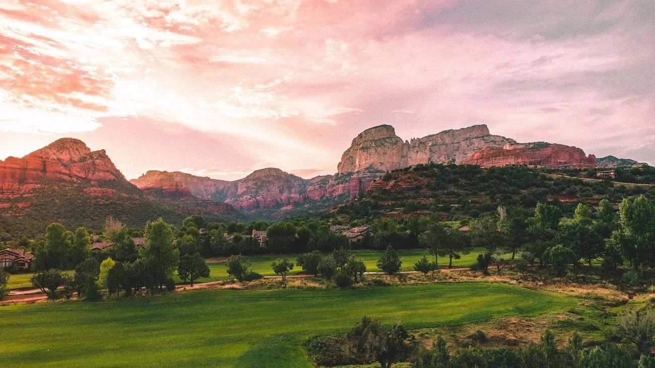 Sunset panoramic view of Seven Canyons Golf Course in Sedona’s desert canyon setting