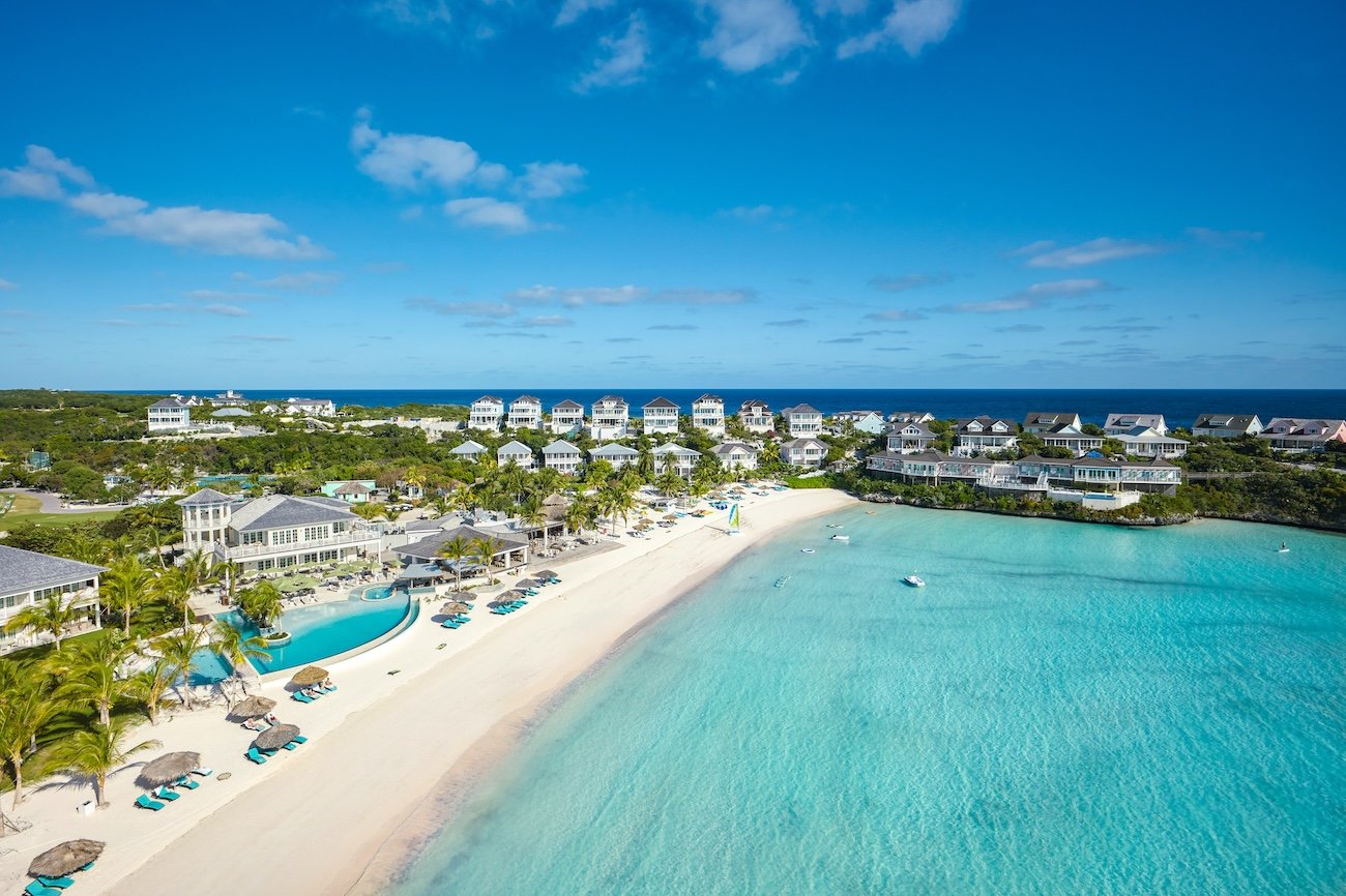 Family-friendly beach at The Abaco Club with white sand and calm shallow water