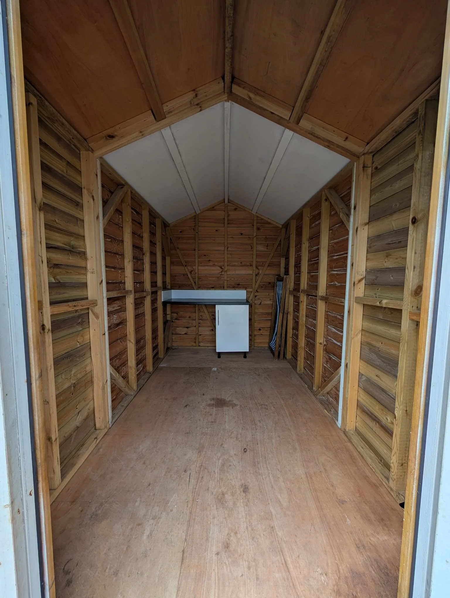 Instead of treating the hut as a single-use room, the design considers how the space shifts over the course of a day. Arrival, changing, preparing food, sitting together, packing away - each moment placing a different demand on the same footprint.