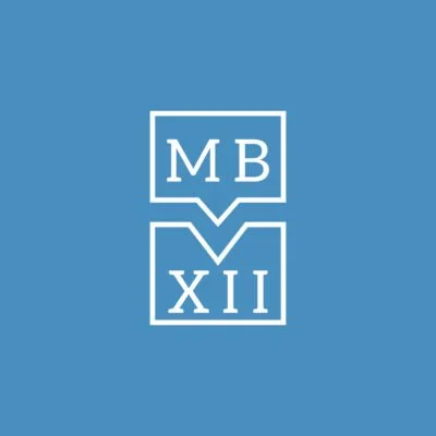 The image features a blue background with a white logo consisting of two squares connected by a downward arrow. Inside the top square are the letters 'M B' and inside the bottom square are the Roman numerals 'XII'.