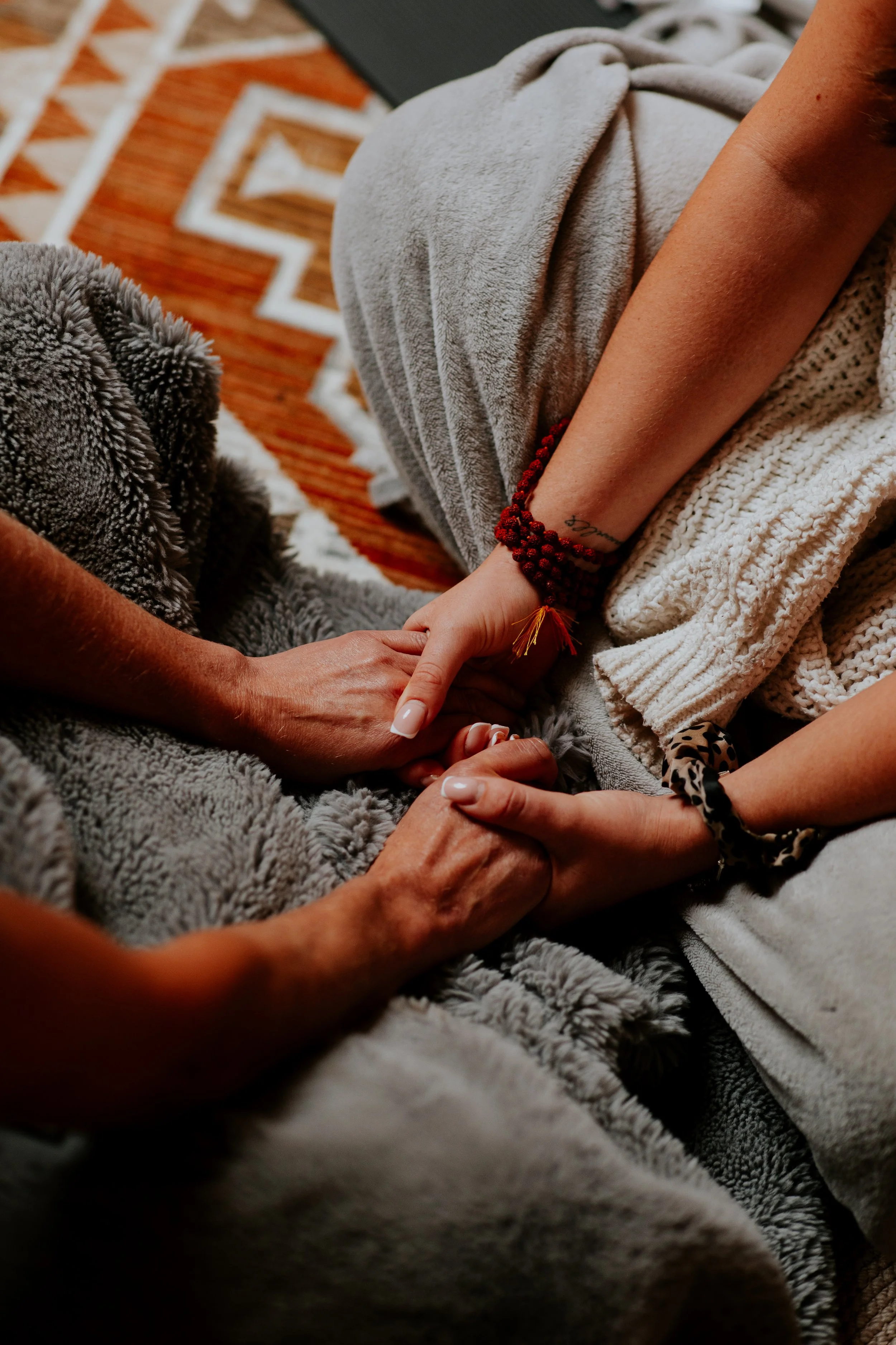 2 people holding hands