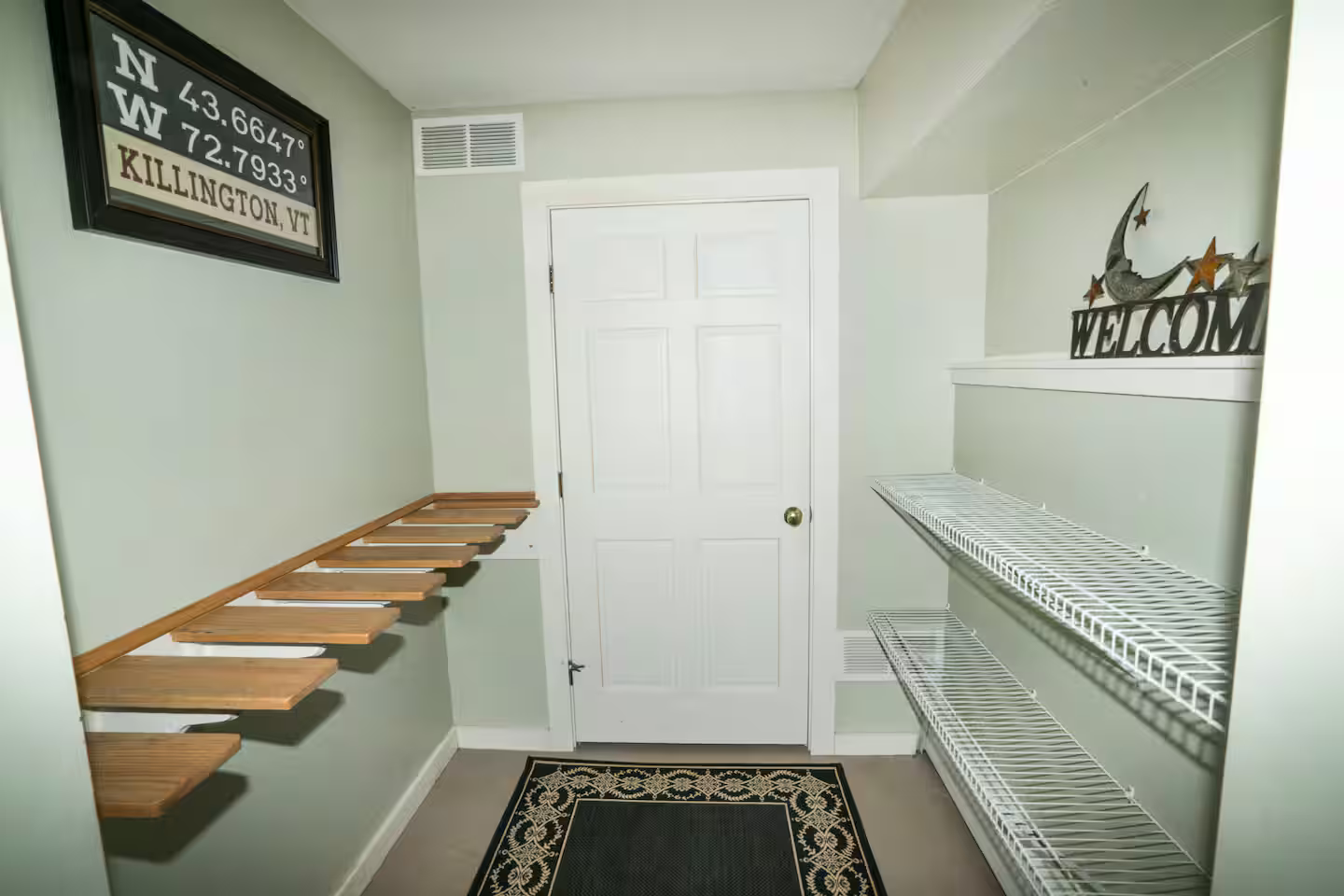 Mudroom at Entry
Organized mudroom with shelves and racks keeps ski equipment, boots, and gear neatly stored—no need to track snow through the house.