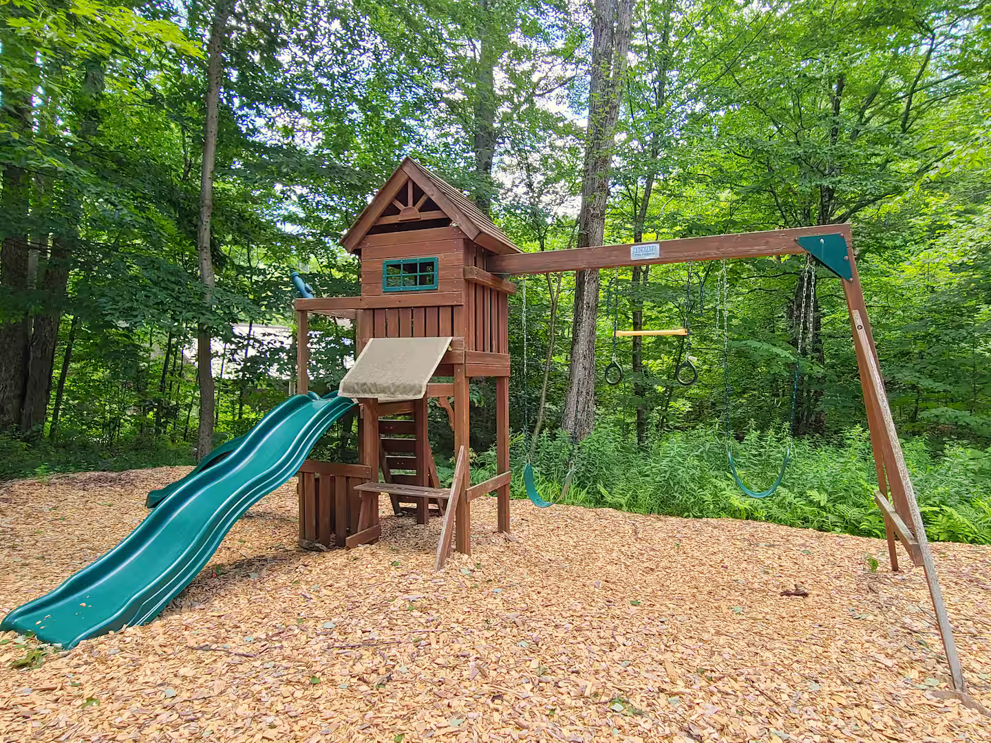 Playscape
Kids will love the swing set and slide, keeping them entertained while adults relax nearby.