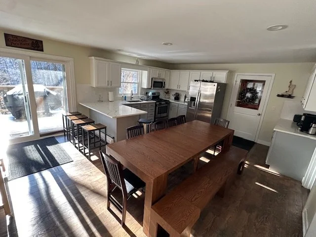 Large dining table with expandable leaves to sit up to X