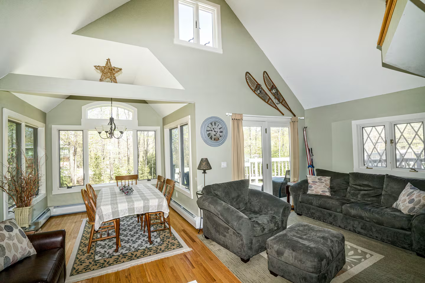Deck Access
Step directly from the living room onto the spacious front deck for morning coffee or evening relaxation in the peaceful wooded setting.